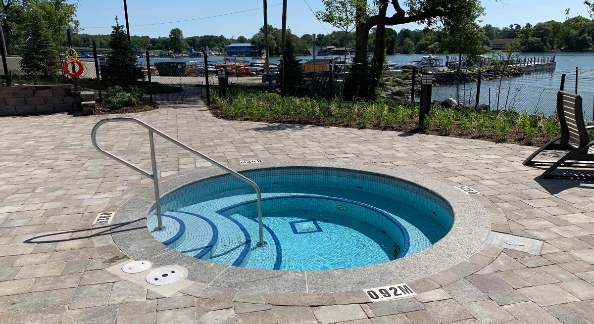 Outdoor spa with lakeside views at the Orchard Point Harbour condos in Orillia, Ontario